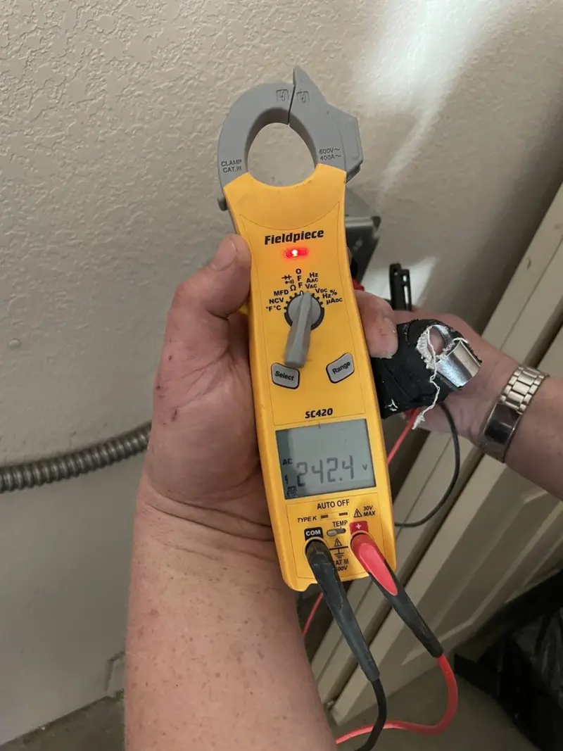 Voltage testing with clamp meter during Aluminum Wiring Replacement in Bee Cave